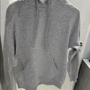 New yorker duks sa kapuljacom