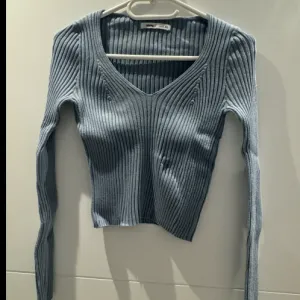 Sinsat trikotazna bluza