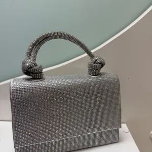 Zara torbica sa cirkonima