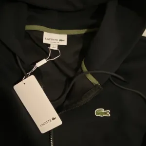 Lacoste duks M