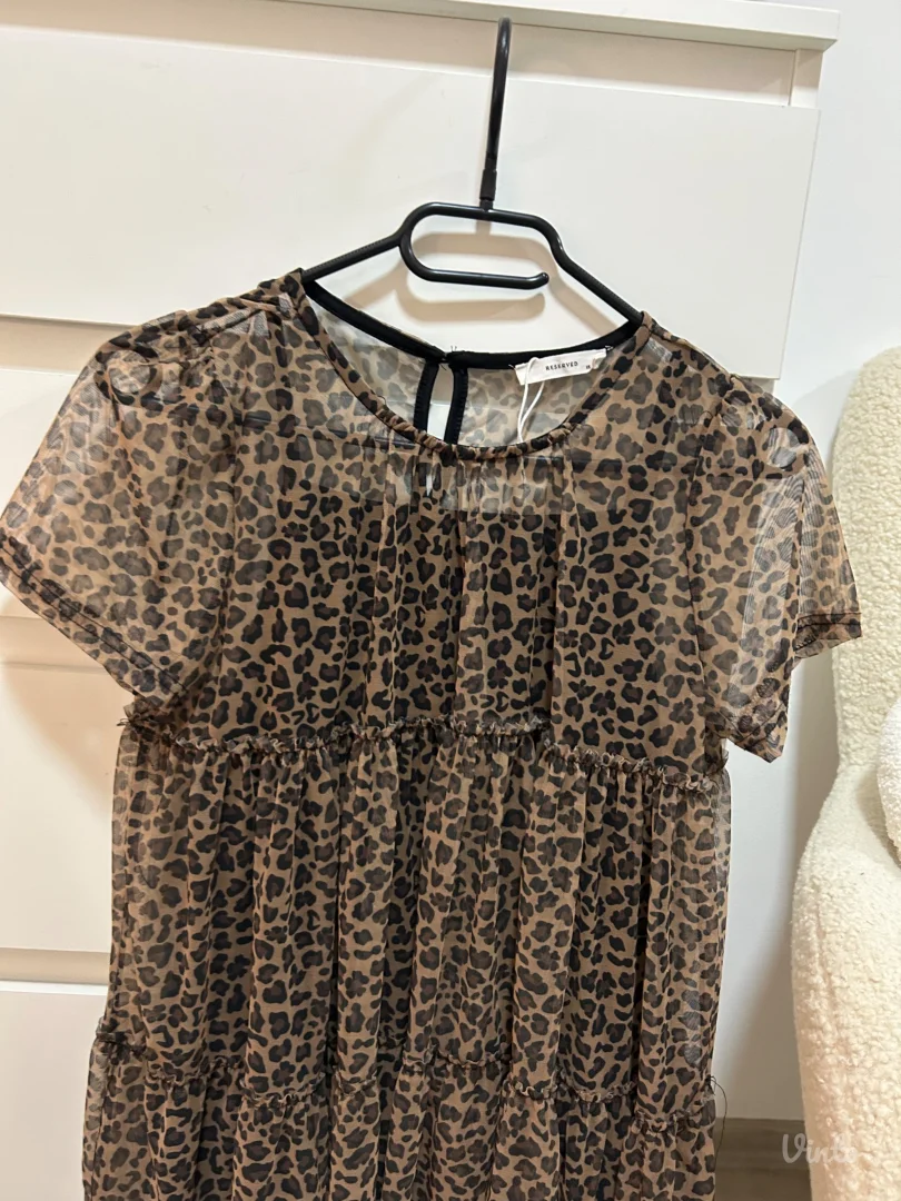 2 haljinice 11/12 god 152 velicina