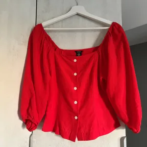 Lindex top sa puf rukavima