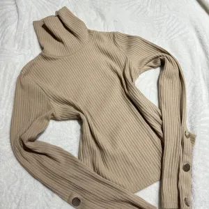 Tally Weijl elegantna bež rolka