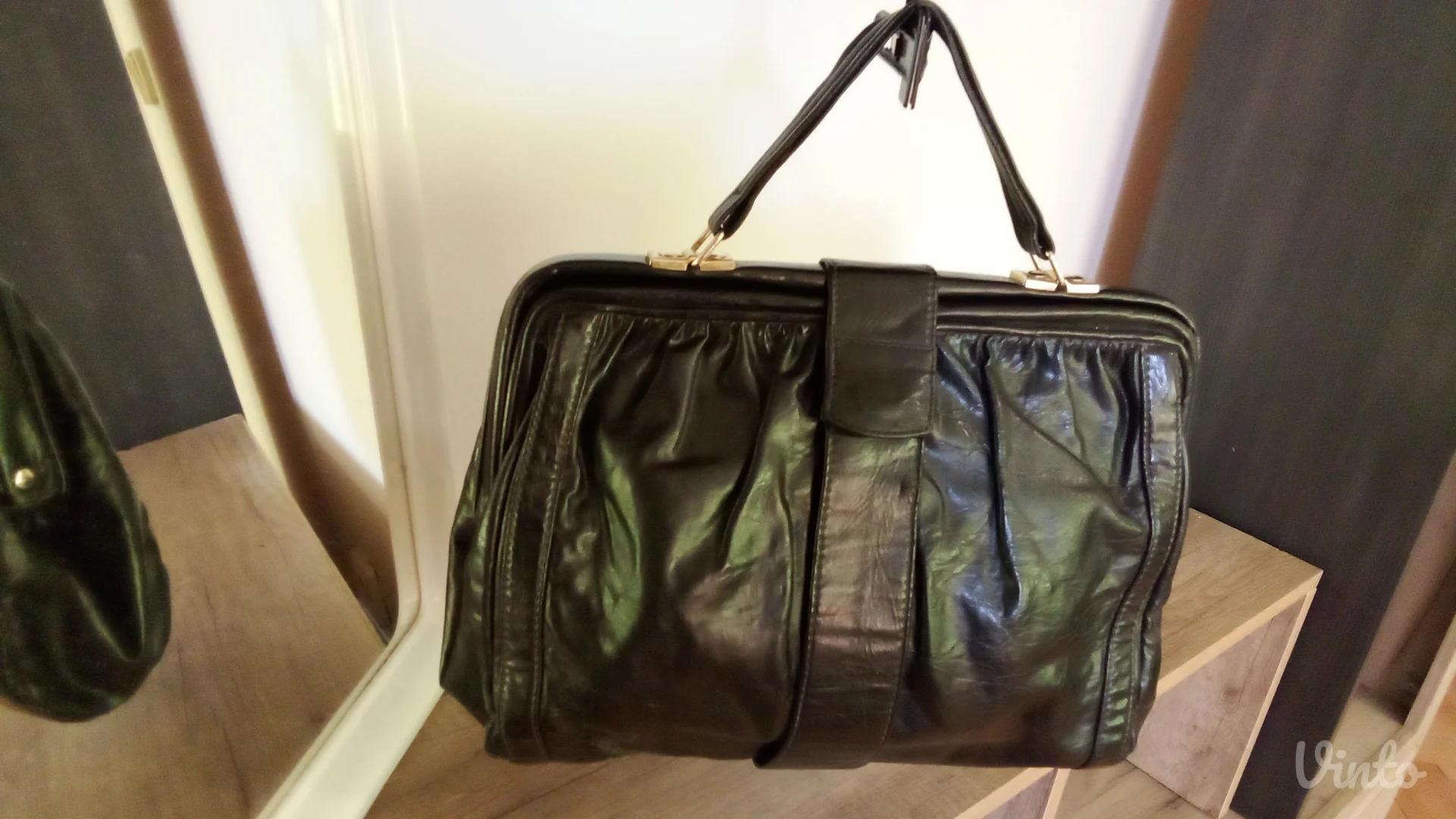 Merkur kožna torbica