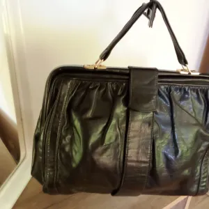 Merkur kožna torbica