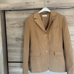 Ženski bež sako