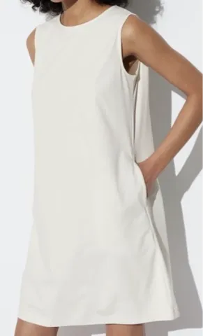 Nova UNIQLO krem haljina XS veličina