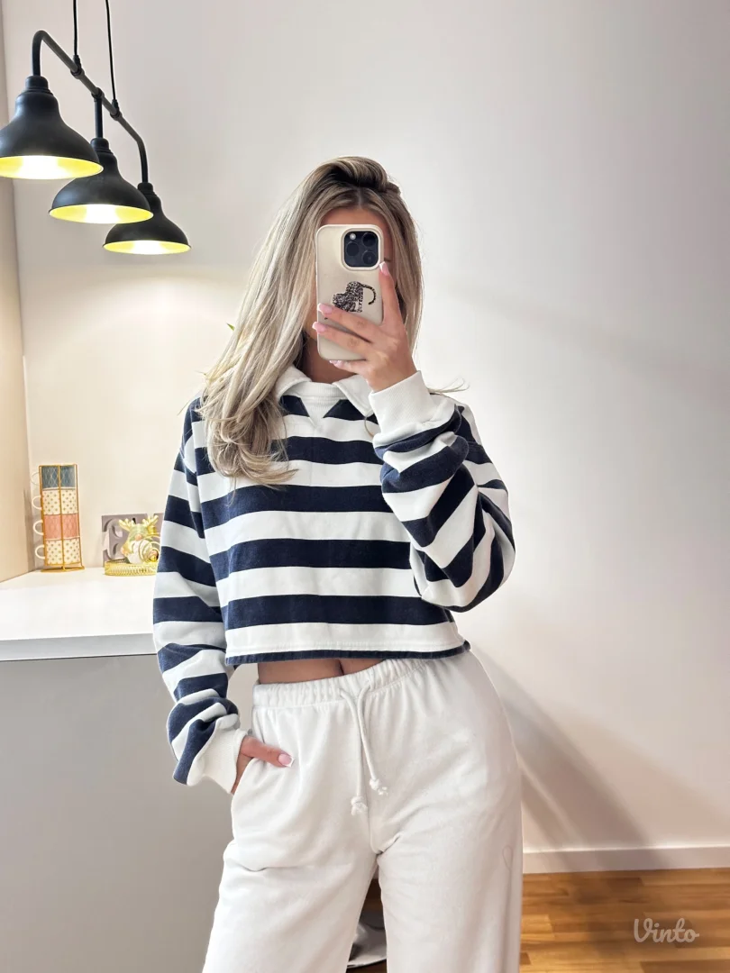 Prugasti duks sa kragnom