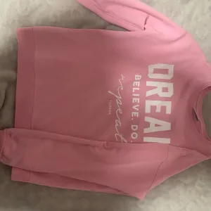 Roze dukserica