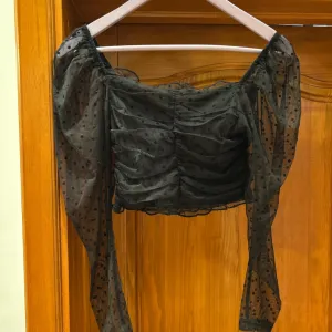 Tufnasti top