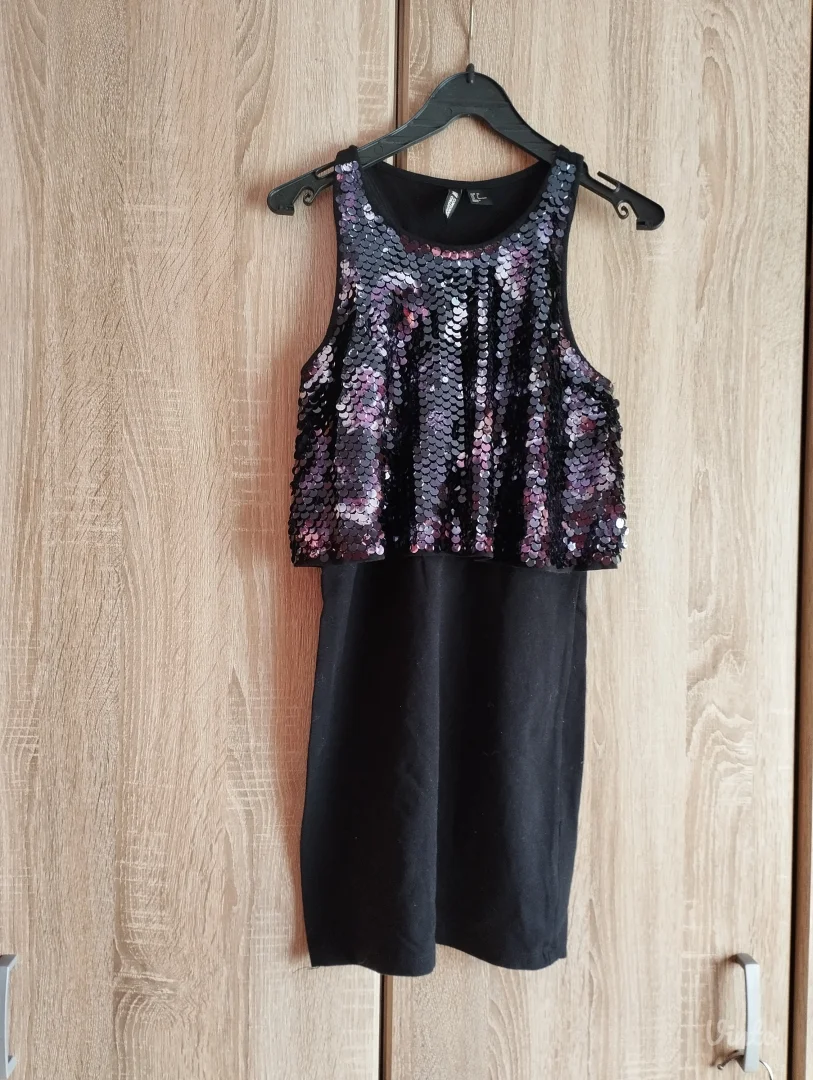 Elegantna H&M Conscious haljina detaljima