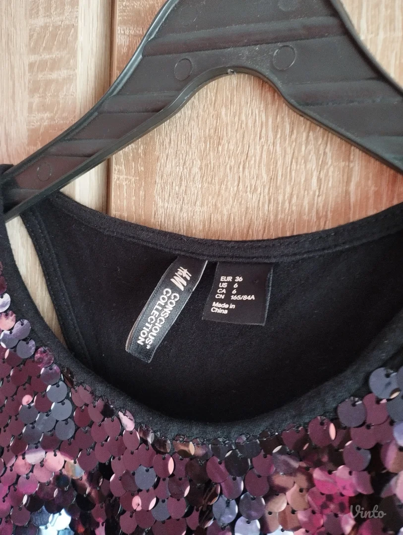 Elegantna H&M Conscious haljina detaljima