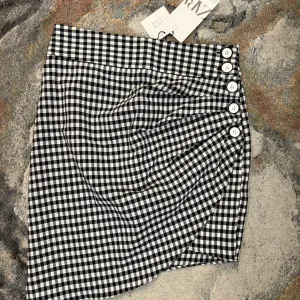 Nova Zara asimetricna suknja