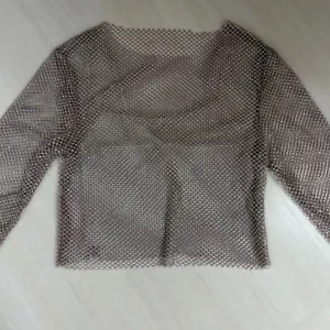 Stradivarius šljokičavi top