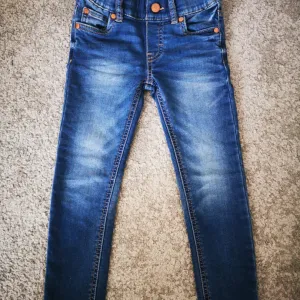 Lindex skinny farmerke, vel. 104