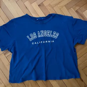 Plava ženska majica