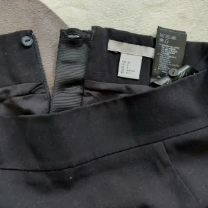 H&M crna pencil suknja 38