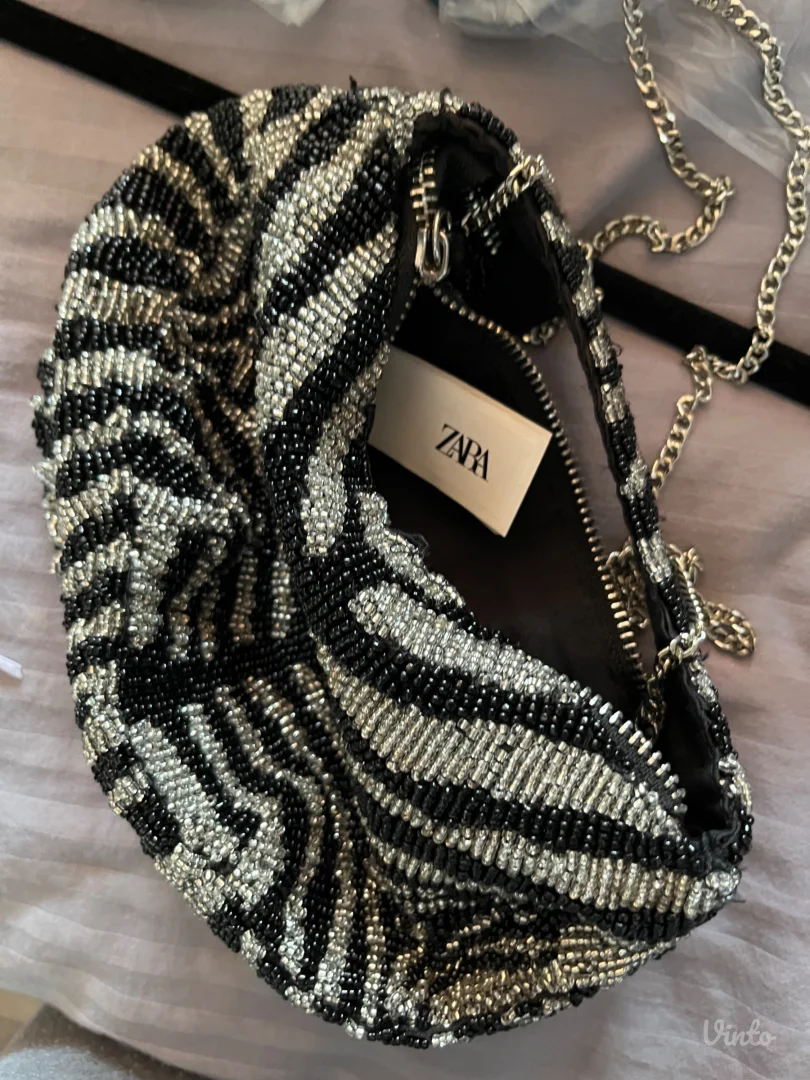 Zara torbica sa sjajnim perlicama