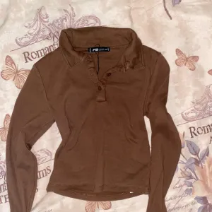 New Yorker bluza sa kragnom