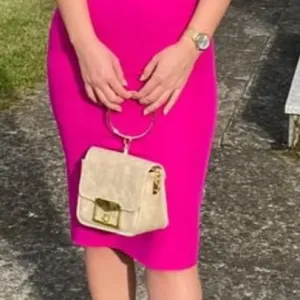 Zenska haljina - ciklama roze boje