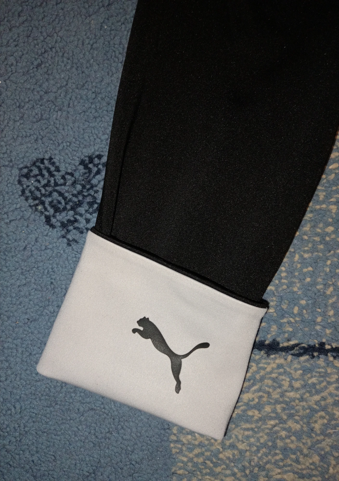 Puma crne helanke sa belim detaljima i natpisom / Vel. M
