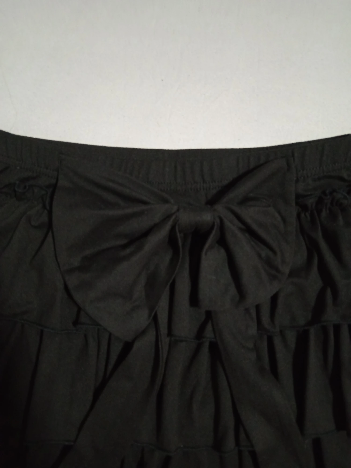 Shein crna mini suknja sa karnerima i mašnom / Vel. S