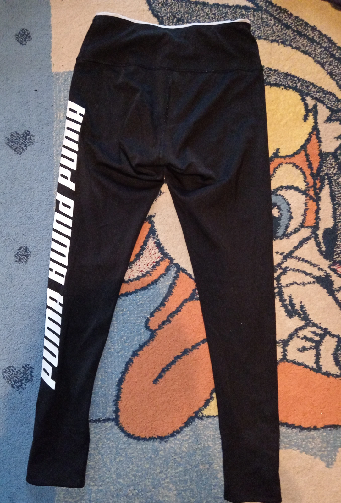 Puma crne helanke sa belim detaljima i natpisom / Vel. M