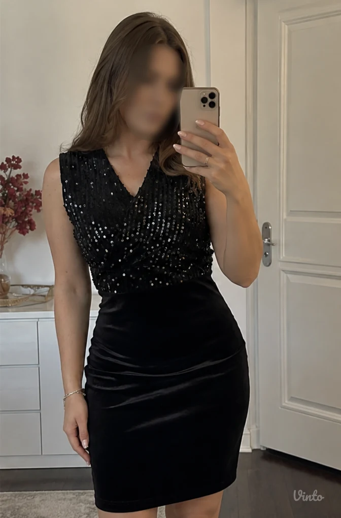 Elegantna crna haljina sa šljokicama