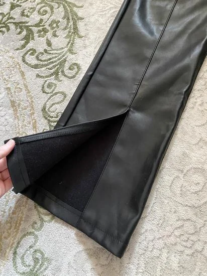 Kozne pantalone sa izrezom