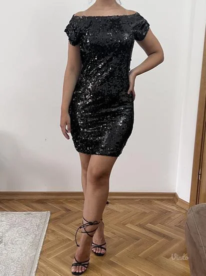 Crna sljokicava haljina