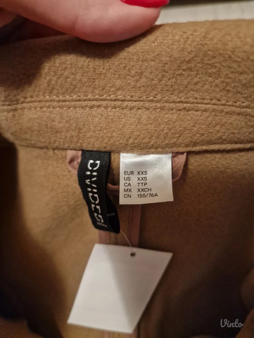 H&M kaput sa etiketom