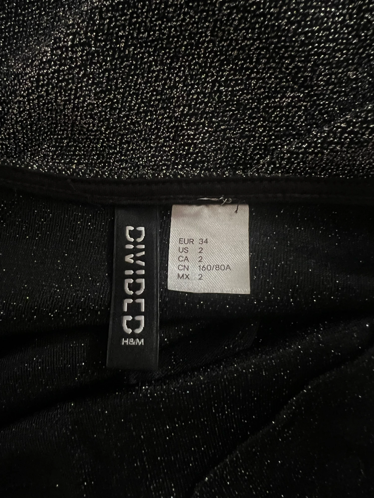 H&M crno-srebrni kombinezon na bretele