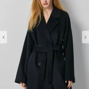 House - crni zimski kaput