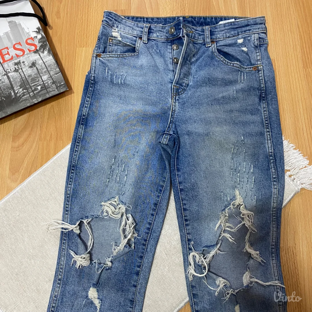 Pocepane duboke farmerke 38