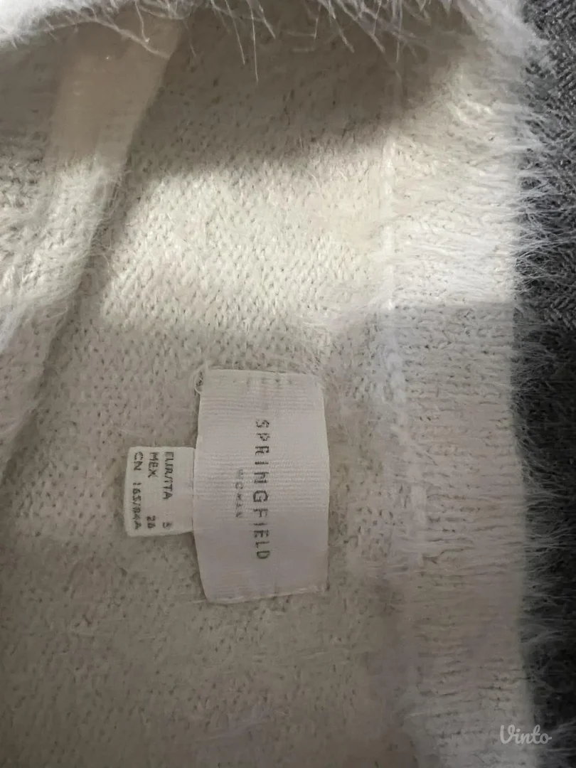 Springfield cupavi beli dzemper sa šljokicama