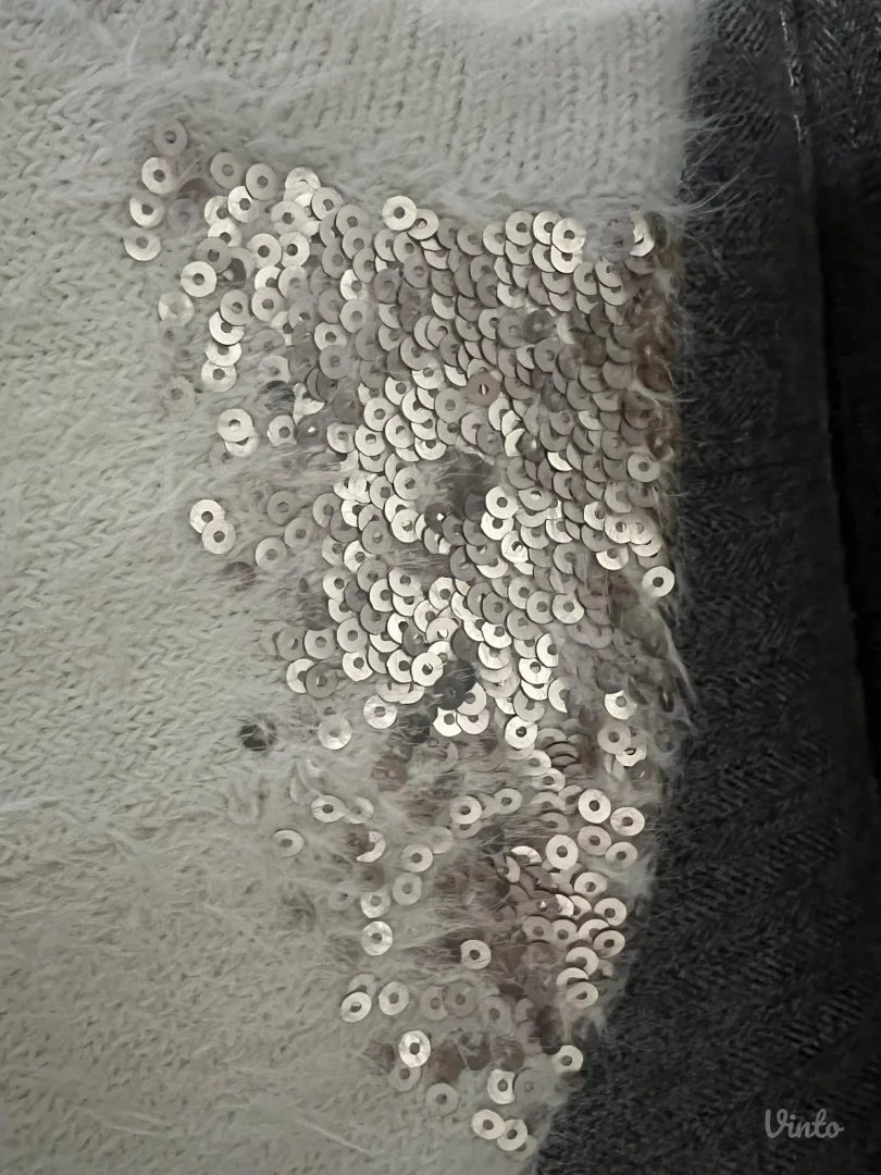 Springfield cupavi beli dzemper sa šljokicama