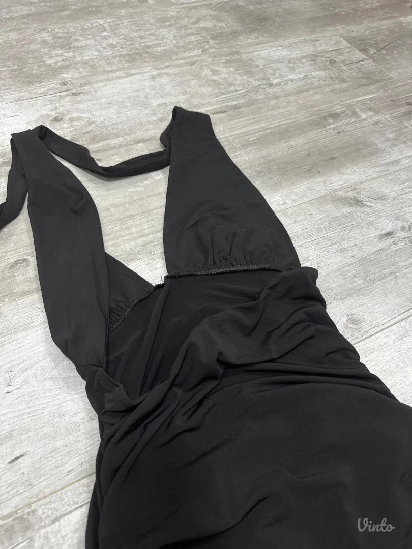 Cena haljina sa otvorenim ledjima