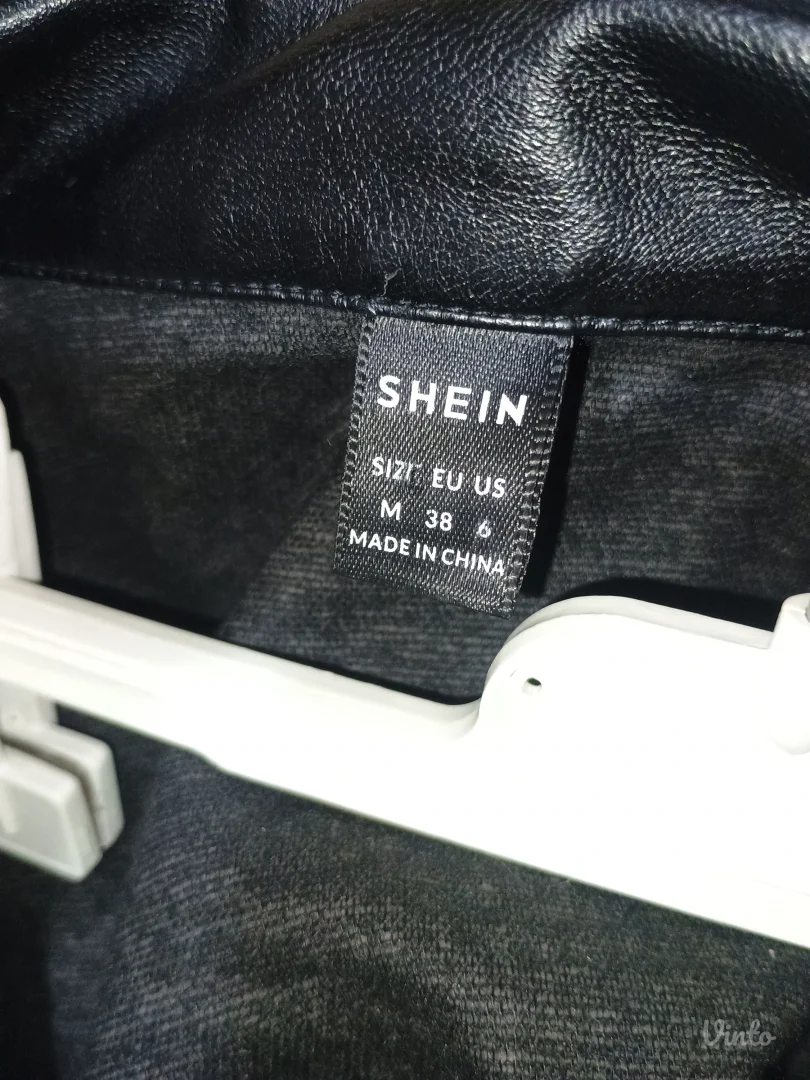 Shein - crna kratka jakna s resama