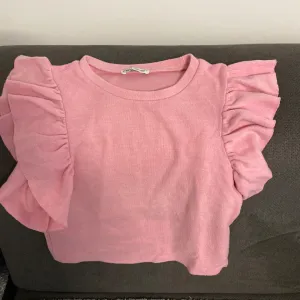 Zara atraktivna pink majica sa puf rukavima