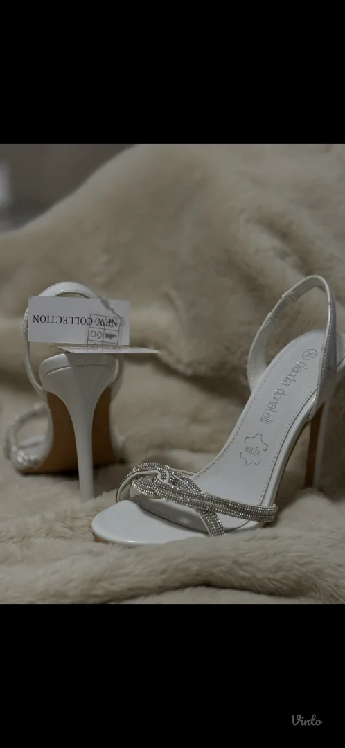 Bele sandale sa visokom potpeticom