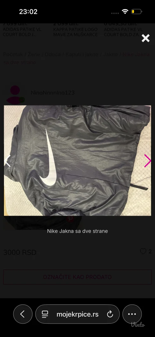 Nike - crna zenska jakna sa dve strane