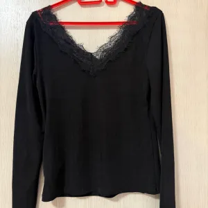 H&M elegantna bluza M