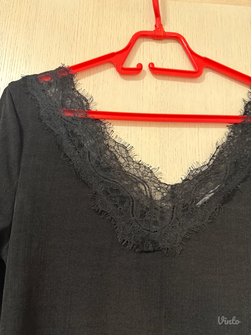 H&M elegantna bluza M