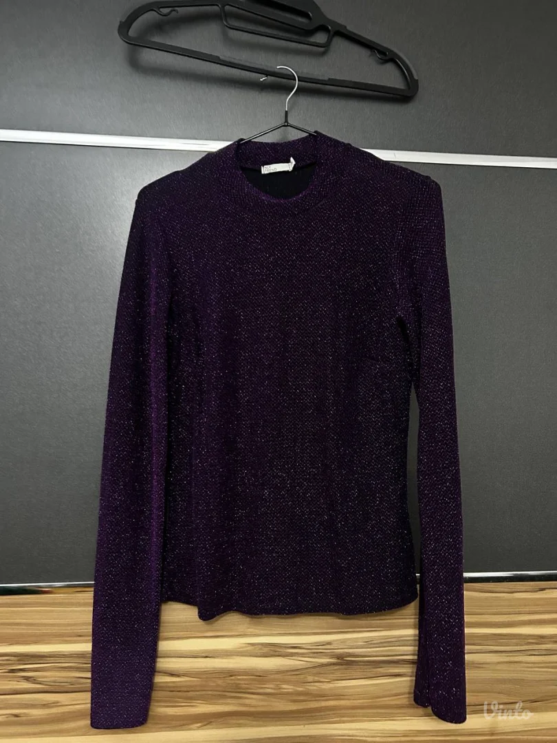 Crna rolka sa ljubičastim šljokicama