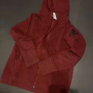 NOV UNISEX duks ADIDAS ZNE Veličina S