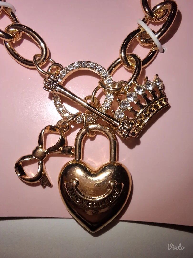 NOVA zlatna Juicy Couture narukvica sa privescima