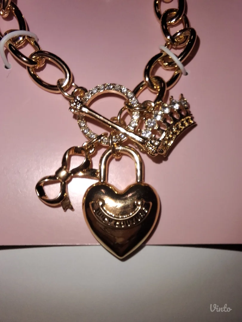 NOVA zlatna Juicy Couture narukvica sa privescima