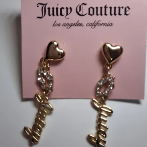 Nove original zlatne Juicy Couture kiss mindjuse