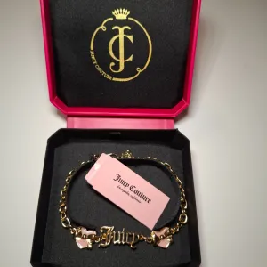 NOVA zlatna Juicy Couture narukvica + kutija