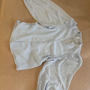 Košulja sa velikim rukavima